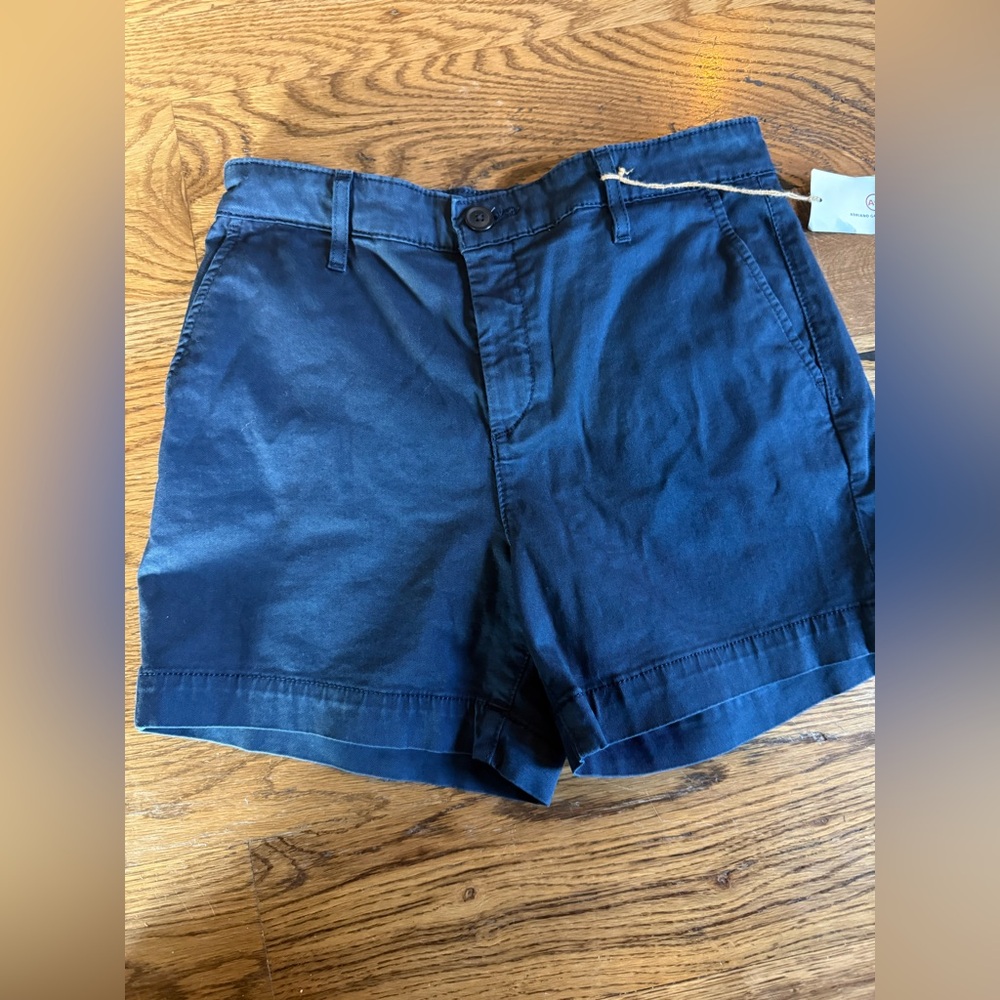 NWT. AG. Caden Short. TAILORED TROUSER SHORT. Navy. Size 25.